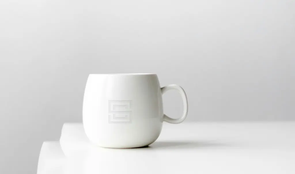 Cro Sea Villas brand identity β minimalist mug and product design mockup
